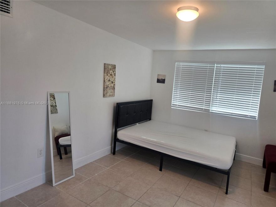 Beautiful efficiency, move-in ready! This cozy space features impact windows, a renovated kitchen, and a modern bathroom. Ideal for one person or a student seeking comfort and convenience. Prime location near Miami Dade College North Campus, major highways, supermarkets, and more.