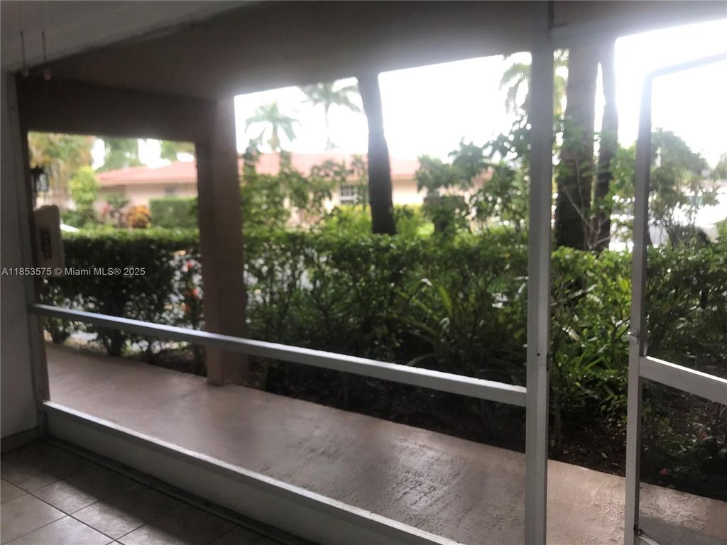 Photo of 501 Blue Heron Dr #110-A, Hallandale Beach, FL 33009 (MLS # A11853575)