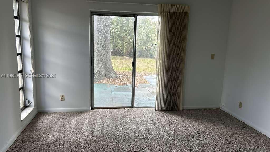 Photo of 13731 Flora Pl #A, Delray Beach, FL 33484 (MLS # A11995947)