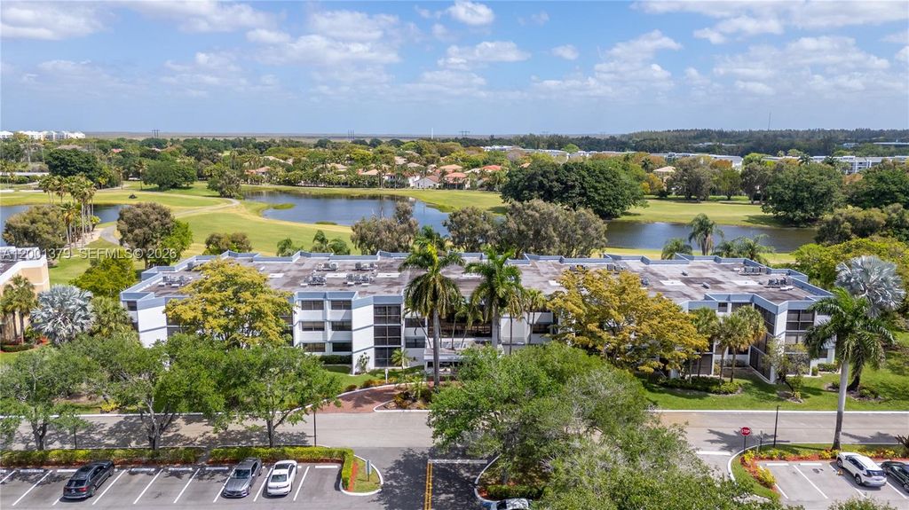 Photo of 16251 Golf Club Rd #311, Weston, FL 33326 (MLS # A12001379)