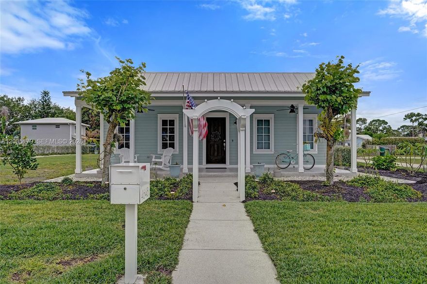 Not your typical Stuart property, this one delivers flexibility, upgrades & future potential. This 4 bedrooms, 3 baths home built in 2011 sits on a corner lot & includes a separately deeded, buildable lot (50x150) w/potential for a second home, ADU, guest house or pool. Built for durability & peace of mind, the home features impact windows & doors, a metal roof plus a whole-house Kohler generator w/a buried 500-gallon propane tank. Interior features include vaulted ceilings, luxury vinyl flooring & a freshly painted interior. The split floor plan offers privacy w/a spacious primary suite featuring a walk-in closet plus additional closet space & versatile secondary bedrooms ideal for guests, home office or additional living. The kitchen is outfitted w/high-end cabinetry, wood dovetail soft-close drawers, custom spice storage, slide-outs & under-cabinet lighting. Laundry/mudroom includes oversized LG smart washer/dryer & a 2026 Rheem water heater. Enjoy the screened & covered breezeway with TV, utility sink & additional water connection,perfect for indoor/outdoor living. The oversized 2 car garage offers exceptional storage & functionality. Additional features include Cat 6 wiring, whole-house audio system, security system, smart thermostat & irrigation covering both parcels. Mature landscaping w/fruit trees & privacy hedging. Ideally located just minutes from Manatee Pocket, marinas, public boat ramp, dining & waterfront activities. City water and sewer. No HOA!