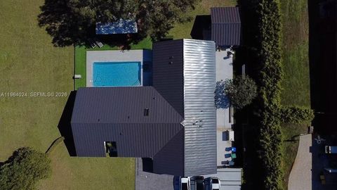 Photo of 5020 Hawkhurst Ave, Southwest Ranches, FL 33331 (MLS # A11964024)