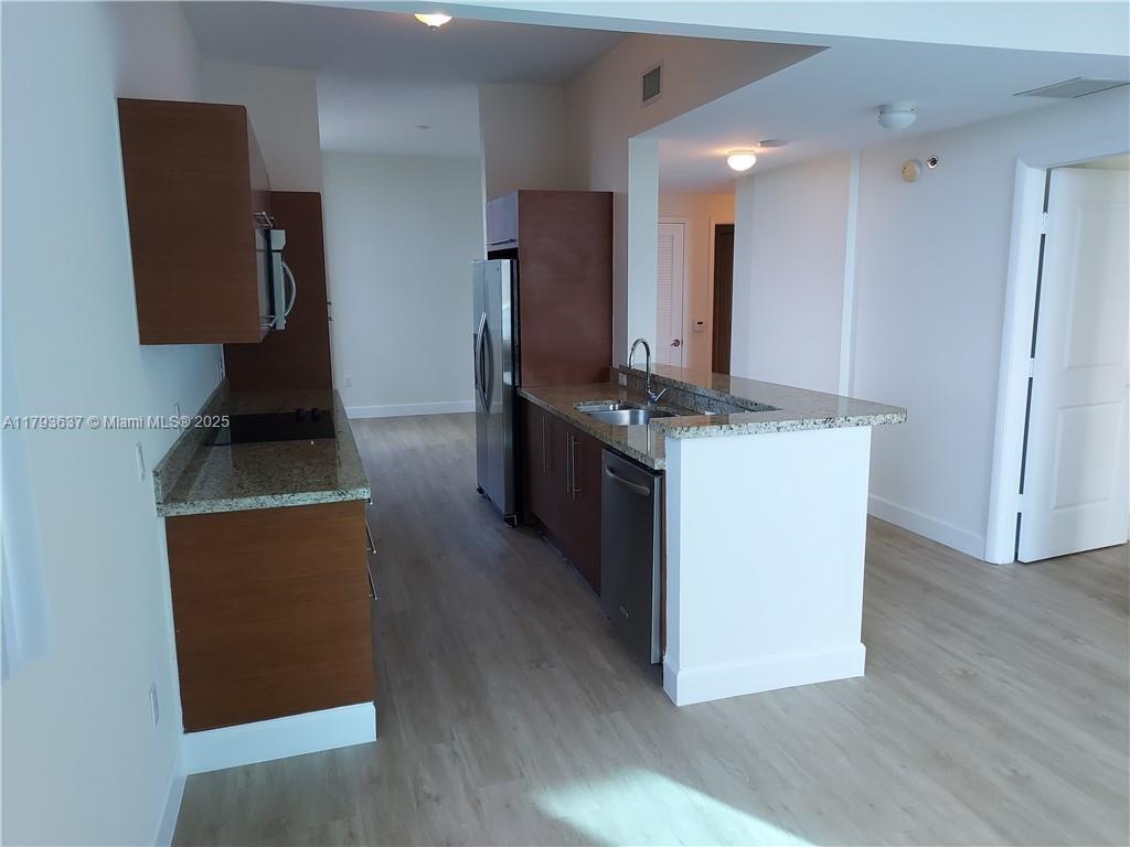 TAO SAWGRASS CONDOMINIUM - Residential