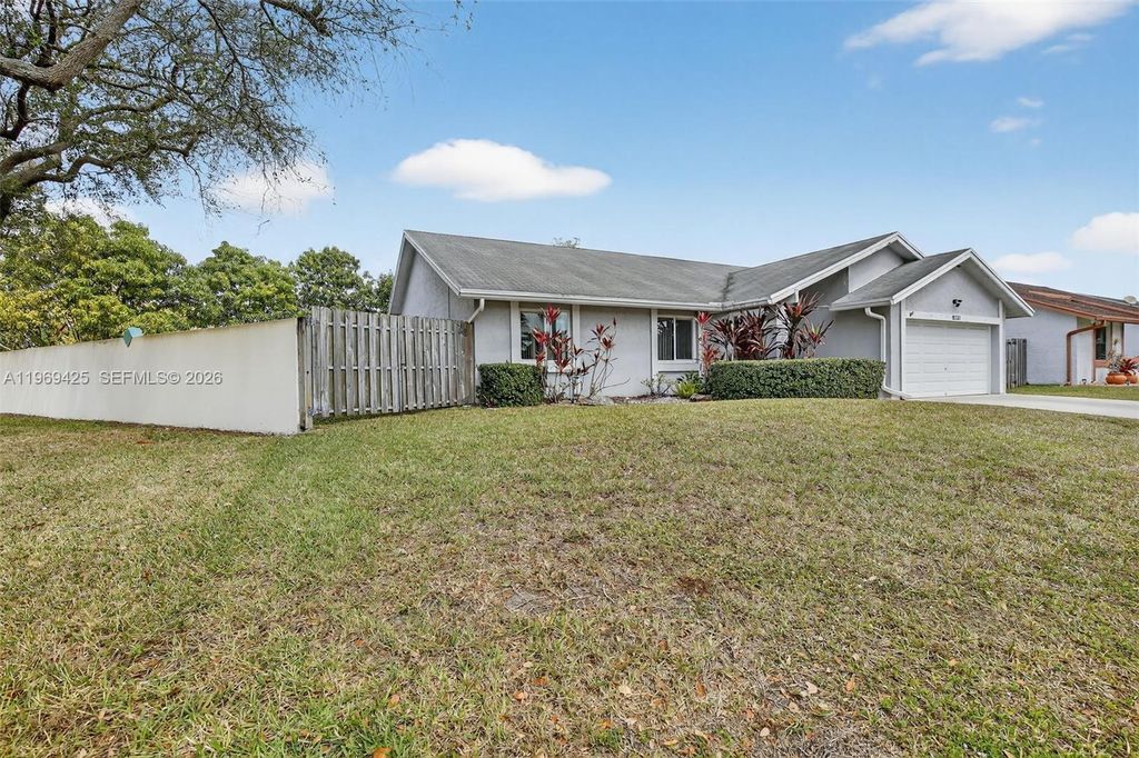 Photo of 9731 NW 32nd Mnr, Sunrise, FL 33351 (MLS # A11969425)