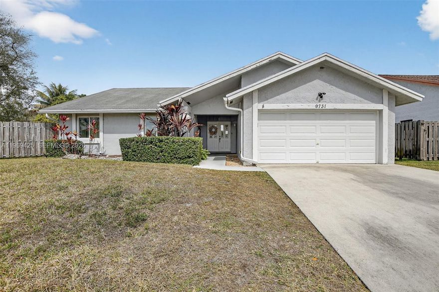 Beautiful 3BR/2BA pool home on an oversized 8,600+ sq ft lot! Impact glass windows & doors plus impact garage door. Brand-new renovated kitchen with wood cabinetry, quartz countertops, subway tile backsplash & stainless steel appliances. Island with wine fridge, extra cabinetry & butcher block—perfect for entertaining. Open layout with vaulted ceilings & recessed lighting. Neutral tile floors throughout, freshly painted interior. Formal dining & breakfast area. Screened porch, paver pool deck, large fenced yard. Low HOA. Prime location off Nob Hill Rd, next to Welleby Elementary & walk to Sunrise Civic Center!