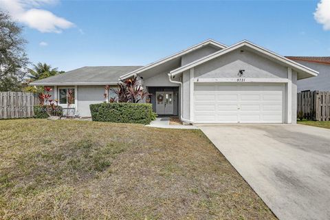 Photo of 9731 NW 32nd Mnr, Sunrise, FL 33351 (MLS # A11969425)