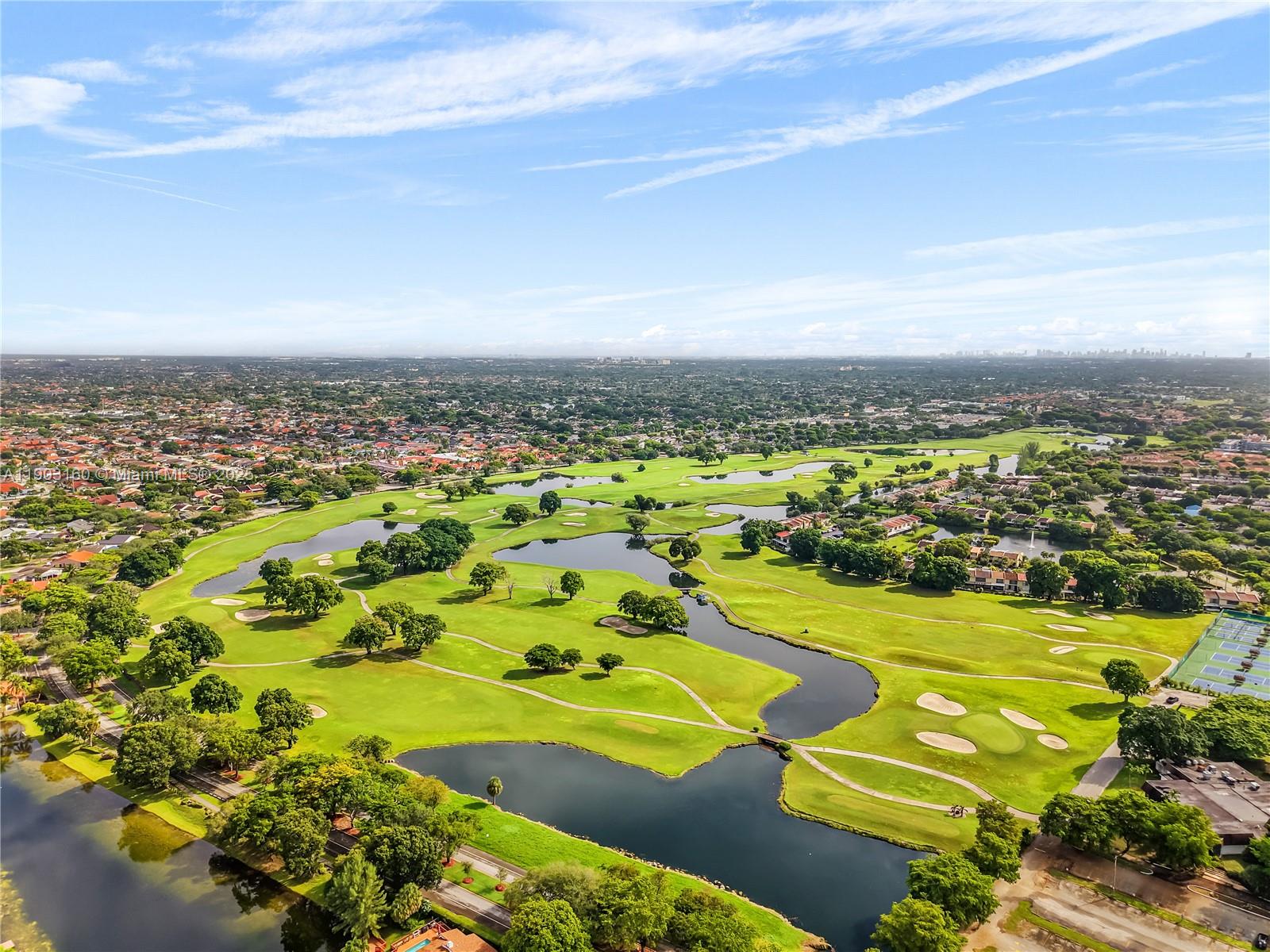 Fantastic Location? Golf Course, Lake, Pool, Jacuzzi, Private Dock & Covered Patio.  Amazing wood vaulted celling adds elegance to the formal living & dining room.  All Tile floors! Eat-in kitchen, dining room, living room, primary bedroom & bath have a view & access to pool, jacuzzi & lake.  Double front doors.  Garage is tiled to match driveway.  Side double gates, perfect for a boat or camper. Barrel tile roof.  Accordion hurricane shutters.  Corner lot.  Across the street to a golf course with tennis, pool & restaurant.  Membership is optional.  Vacant.  Easy to see.  Agent has Key! No approval is necessary from the association.  $34 monthly association fee, paid yearly for $400.00.