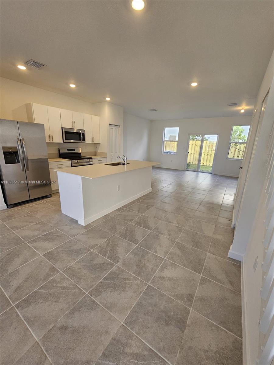 Brand new, never-lived-in 4 bed, 3 bath townhome in Homestead, FL. 1748 sqft, 2 assigned parking spaces, patio, open-concept floor plan with large island kitchen, and walk-in closet. Near Turnpike, US1, the Keys, outlets, dining. Also, brand new Publix and Homestead High School across the street, and a beautiful park. A must-see!