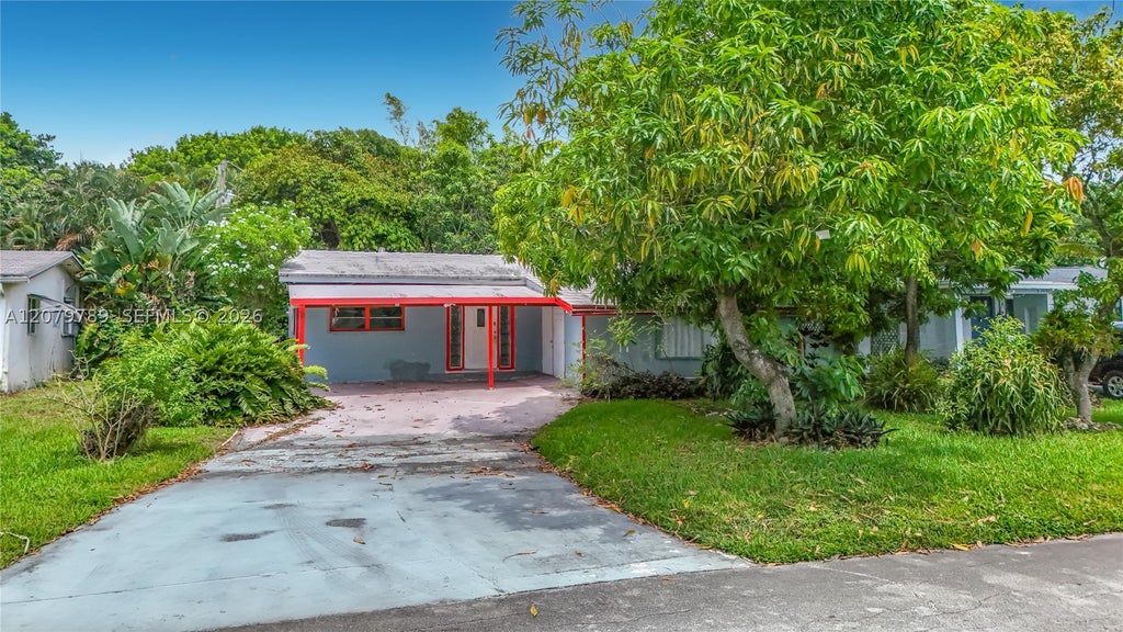Photo of 5661 Allen St, Hollywood, FL 33021 (MLS # A12079789)