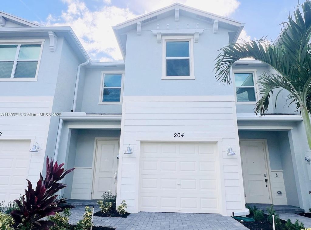 Photo of 204 SE Woodbark St, Port St Lucie, FL 34984 (MLS # A11809791)