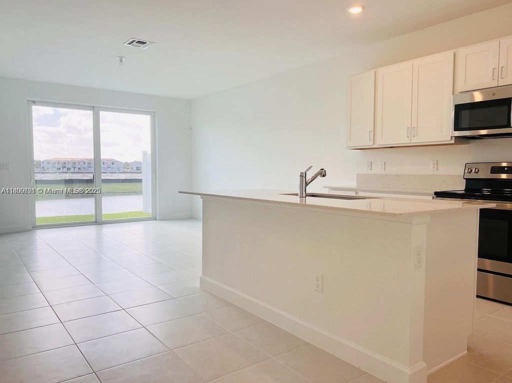 Photo of 204 SE Woodbark St, Port St Lucie, FL 34984 (MLS # A11809791)