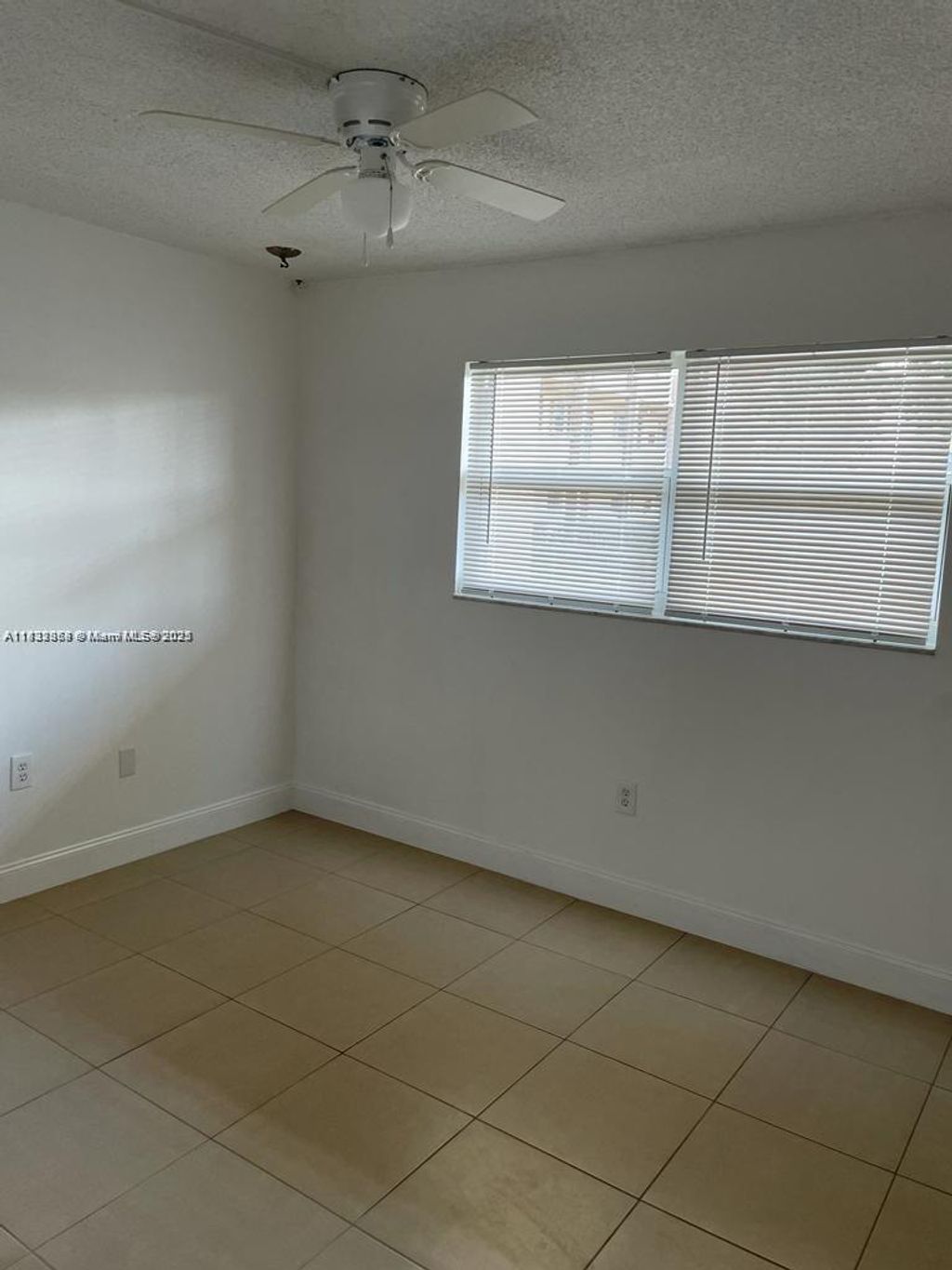 Photo of 8325 Sunrise Lakes Blvd #104, Sunrise, FL 33322 (MLS # A11832868)