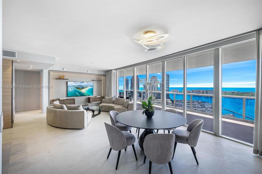 Experience luxury living in this 06-line apartment designed by Jeffrey Thrasher. Spanning over 2,000 square feet, this stunning residence features a 500+ square foot wraparound terrace, ideal for lounging and outdoor dining while enjoying breathtaking Sunrise-to-Sunset views. Custom features include, recessed lighting, electric blinds, surround sound, and sleek frameless doors enhance the space, complemented by a chef's kitchen, custom built-ins and a spacious walk-in closet, this home will impress. Murano Grande features resort-style amenities, including a pool, fitness center, tennis courts, and 24-hour concierge service, all just steps away from the finest dining, shopping, and beaches in the exclusive South of Fifth neighborhood.