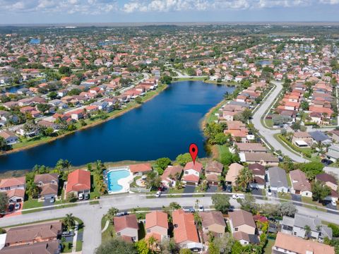 Photo of 2130 NW 184th Way, Pembroke Pines, FL 33029 (MLS # A11861994)