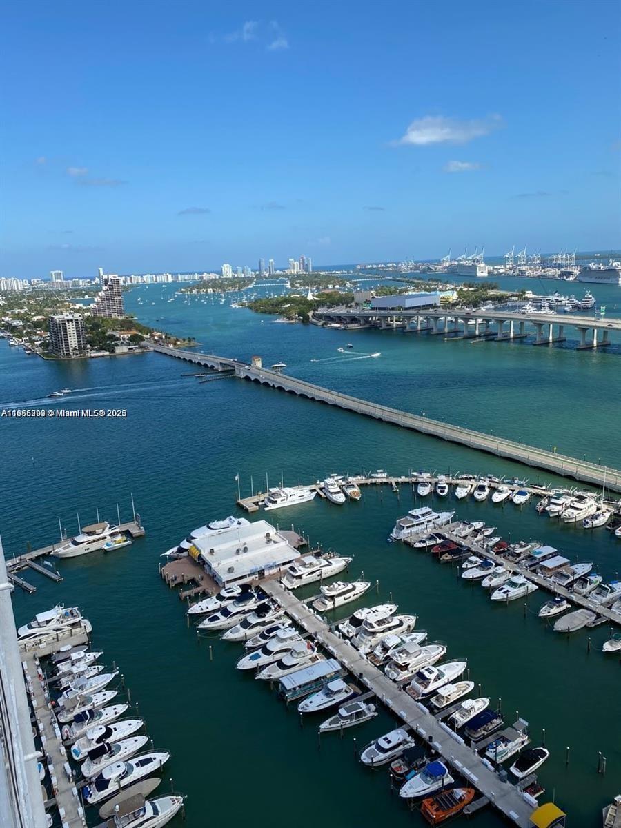 ANNUAL/SHORT AFTER 09/01/26….LOVELY BAY/PORT/MARINA VIEWS FROM 2 BALCONIES, COMPLETELY REMODELED & FULLY FURNISHED 3/2, MARBLE FLOORS THRU-OUT, LARGE OPEN GRANITE KITCHEN, MASTER HAS EXPANSIVE WALK-IN, DUAL SINKS, BIDET, NEW FLOOR-TO-CEILING IMPACT WINDOWS & DOORS, NEW AC . . . WASHER/DRYER IN UNIT . . . PETS OK . . . Full-Service Building Includes Retail Shops (Mini-Mart, Dry Cleaners, Restaurants, Pharmacy, Beauty Parlor & More) Access To Hotel Class Amenities, Such As Elaborate Spa/Gym Center, 4 Large Hot Tubs, Water View State Of The Art Gym, Sauna Steam Room, Olympic Size Heated Pool, 24 Hours Concierge, Valet ... Near Performing Arts Center, Miami Heat Arena, Bay-Front Park, Bayside Shops, Brickell, Midtown...Walk to public train to airport & So Much More... See Youtube Preview ...