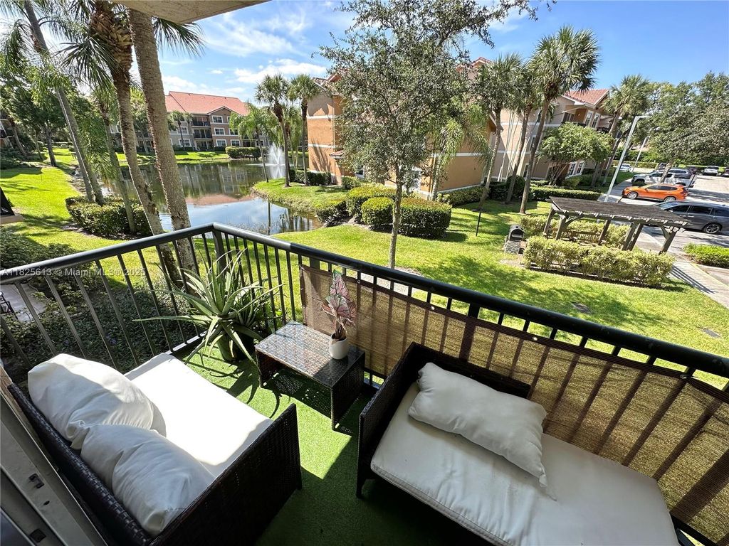 Photo of 8955 Wiles Rd #208, Coral Springs, FL 33067 (MLS # A11825613)