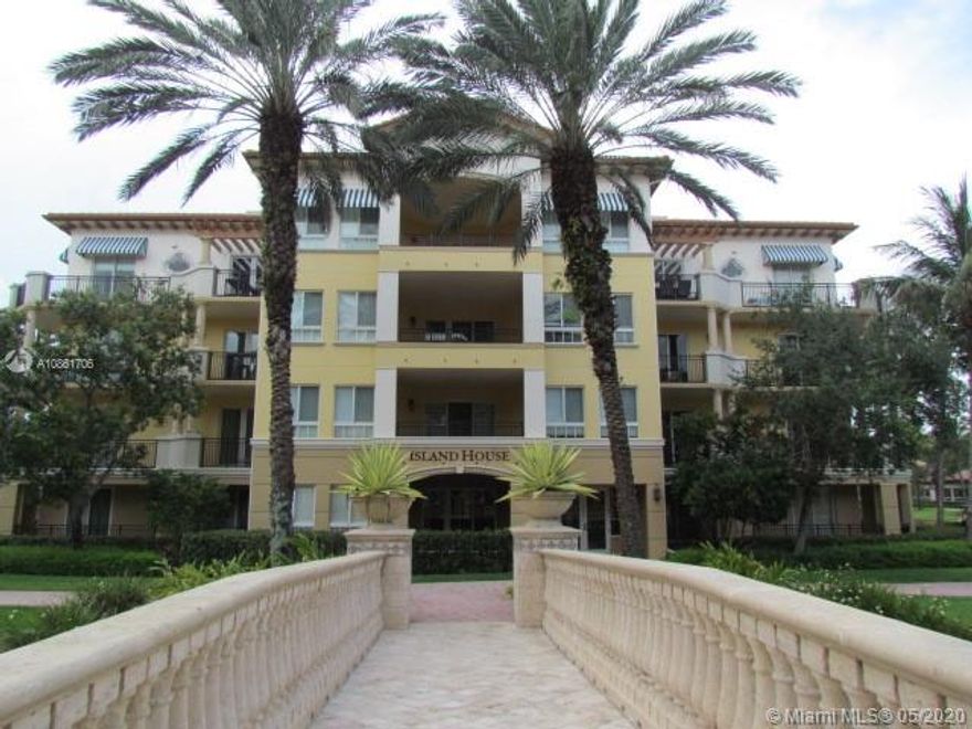 A 55+ COMMUNITY LUXURY LIVING THE PALMS AT WESTON. BEAUTIFUL 1,725 SF CORNER UNIT LIGHT AND BRIGHT. 2 BEDROOMS / 2.5 BATHS PLUS DEN/OFFICE. LAUNDRY ROOM IN UNIT WITH TUB. LARGE KITCHEN HAS 48" WOOD CABINETS, GRANITE COUNTER TOPS AND STAINLESS STEEL APPLIANCES. BATHROOMS HAVE MARBLE FLOORS, WOOD CABINETS AND GRANITE COUNTER TOPS. MASTER BATH HAS A WHIRLPOOL. RELAX ON LARGE WRAP AROUND BALCONIES WITH A BEAUTIFUL WATER AND POOL VIEW. CERAMIC TILES AND CROWN MOLDING IN LIVING AREA. UNIT COMES WITH AN X-LARGE A/C STORAGE ROOM. VALET PARKING, LARGE HEATED POOL WITH TWO SPAS, FITNESS CENTER, LIBRARY, SALON, CONCIERGE, RESTAURANT(INCLUDES $60 A MONTH FOOD CREDIT). CLOSE TO RESTAURANTS, BANKS, SHOPPING, CLEVELAND CLINIC HOSPITAL, MAJOR HIGHWAYS.  AN HOPA COMMUNITY.