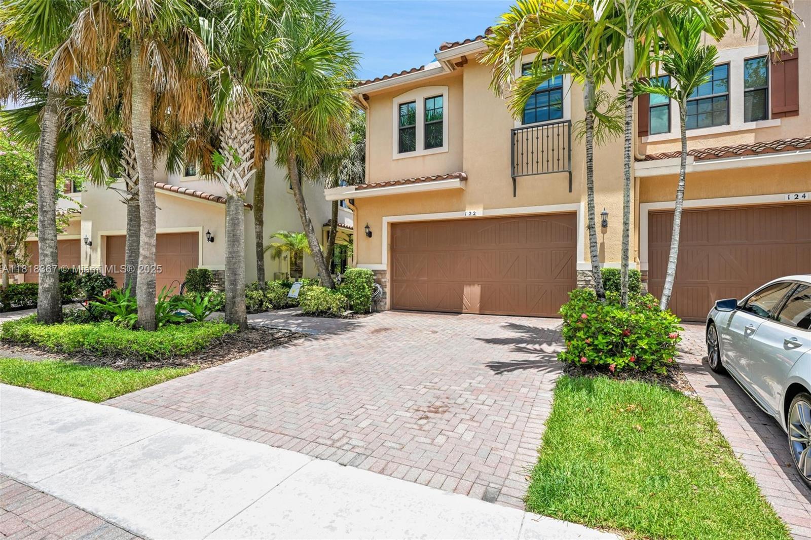 Nestled in the heart of Plantation, this single-family townhome, built in 2016, is a rare find in the prestigious gated community of The Cove of Lago Mar. Just a short stroll from American Heritage School .The residence boasts 3 bedrooms and 2.5 bathrooms, alongside a spacious 2-car garage. The master suite provides a private balcony with breathtaking lake views. The second floor features a loft space, ideal for a home office or play area. Open kitchen with wood cabinets, granite countertops, and stainless steel appliances.Hurricane impact windows. The expansive dining area and breakfast nook overlook the serene lake, with direct access to a porch and tranquil outdoor space. This property is situated within a top-tier school district, making it an ideal family home.