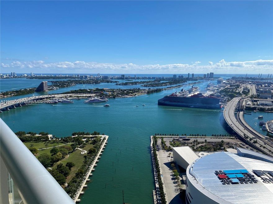 SPECTACULAR WATER VIEWS FROM EVERY ROOM IN THE SOUGHT-AFTER MARINA BLUE! SPACIOUS 1 BEDROOM + DEN, 48TH FLOOR RESIDENCE OFFERS UPDATED QUARTZ KITCHEN, LIGHT FIXTURES, FANS, AND APPLIANCES, CUSTOM WALK-IN CLOSET, FLOOR TO CEILING WINDOWS, IN-UNIT WASHER/DRYER, NEWLY POLISHED MARBLE FLOORS AND SPACIOUS OUTDOOR SPACE TO ENJOY THE SUNRISES AND EVENINGS! EXCEPTIONAL AMENITIES INCLUDING 24HR FRONT DESK ATTENDANT, POOLS, HOT TUBS, FULLY EQUIPPED GYM, VOLLEYBALL AND MUCH MORE. STEPS TO THE THEATER DISTRICT, ARENA, BAYSIDE MARKET PLACE, UNIVERSITIES, METROMOVER, BRICKELL'S FINANCIAL DISTRICT, SHORT DISTANCE TO WYNWOOD, DESIGN DISTRICT, AND SOUTH BEACH! CALL NOW AND COME SEE ALL THAT IS OFFERED.