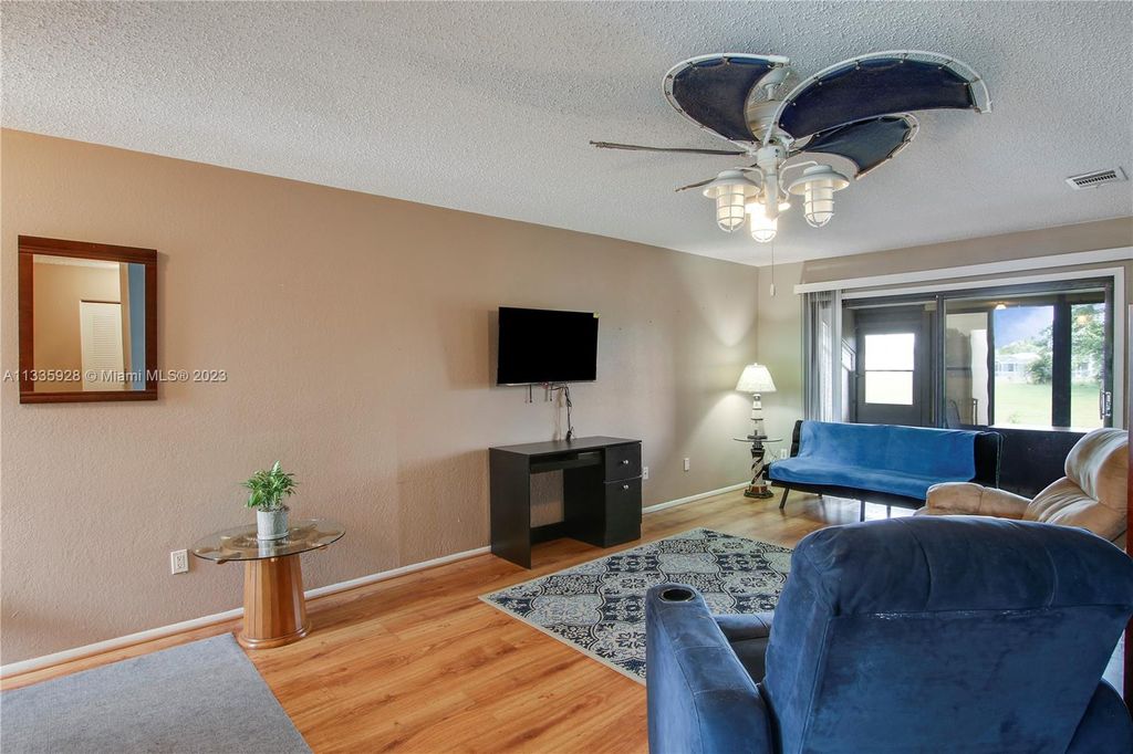 Photo of 449 SW Bill Traitel Ave #449, Port Saint Lucie, FL 34953 (MLS # A11335928)