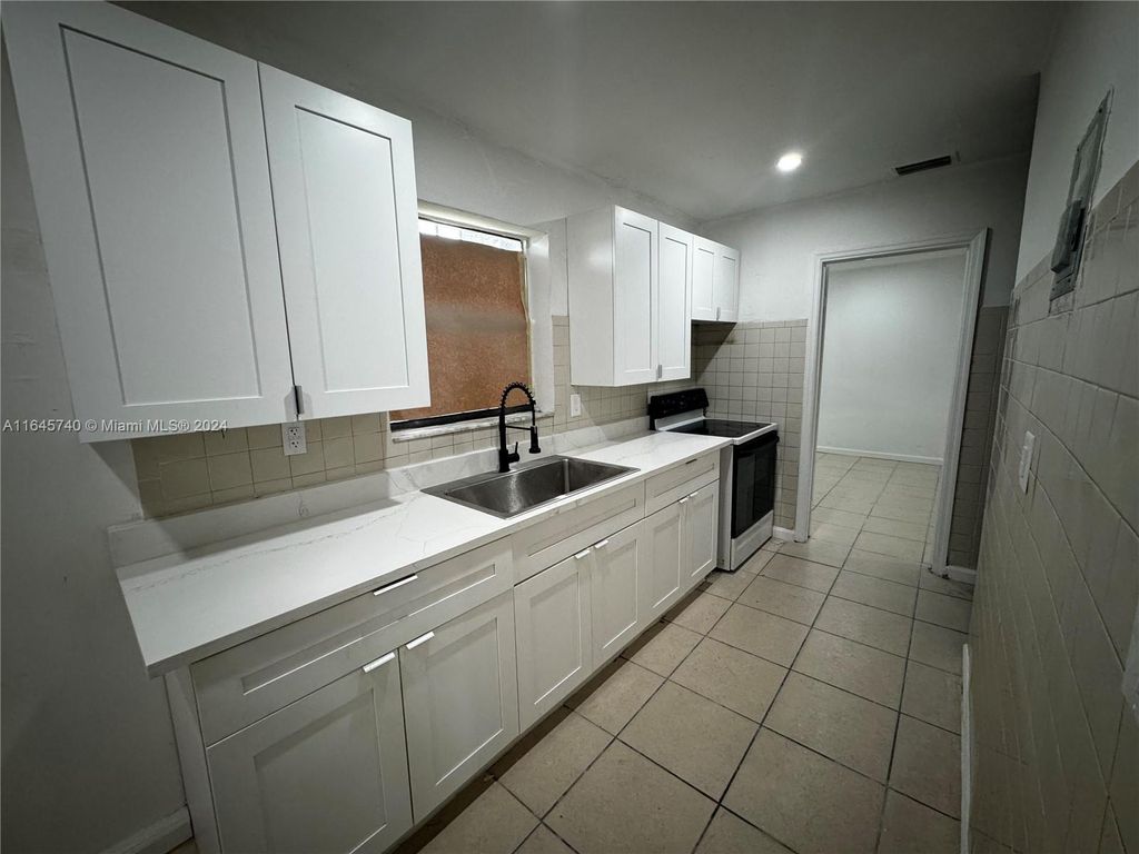 Photo of 2481 NW 13th Ct #1, Fort Lauderdale, FL 33311 (MLS # A11645740)