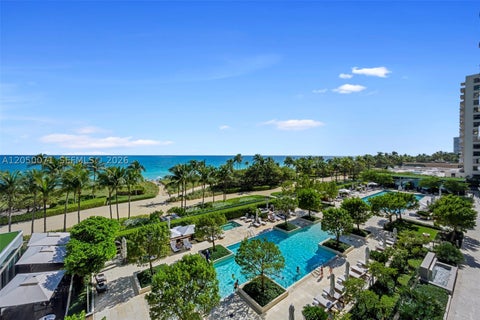 Photo of 10203 Collins Ave #401, Bal Harbour, FL 33154 (MLS # A12050071)