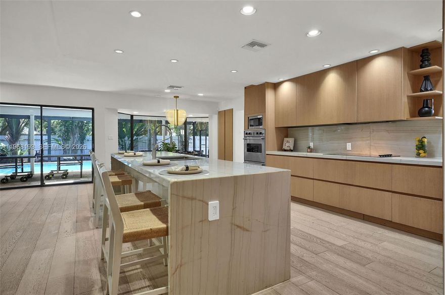 A beautiful 5-bedroom, 3.5-bath residence offering approximately 4,000 sq ft of living space on a 14,728 sq ft lot in the heart of the Emerald Hills community in Hollywood. Close to houses of worships, parks, shopping, dining, and major highways, this home offers both convenience and a quiet residential feel. Positioned on a special block with a luxury, elevated presence reminiscent of Arapahoe Farms, the setting alone sets it apart.

Inside, expansive living areas, high ceilings, and a thoughtfully designed split floor plan create the perfect balance of comfort and sophistication. Designer kitchen. High-end finishes and fixtures add to the sophisticated feel. The layout flows seamlessly for everyday living and entertaining. Generously sized bedrooms include a private primary suite, and the home features abundant closet space throughout. Flexible living areas provide options for a home office, gym, playroom, and/or media room.

The split layout enhances privacy, with three bedrooms on one side and two on the other. Multiple entrances offer the potential to create two separate living spaces if desired. 

The oversized lot provides exceptional privacy and ample space for outdoor living and entertaining—ideal for a large family or hosting gatherings. Seller financing available.