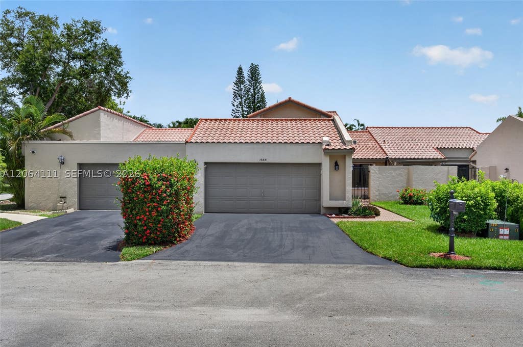 Photo of 16831 Patio Village Ln, Weston, FL 33326 (MLS # A12064111)
