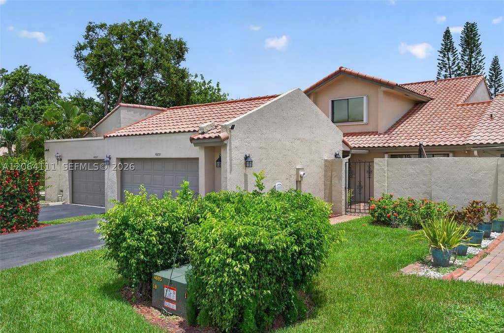 Photo of 16831 Patio Village Ln, Weston, FL 33326 (MLS # A12064111)