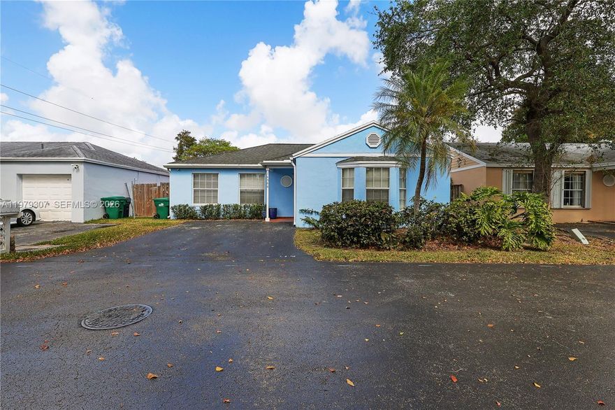 Beautifully distributed 3-bedroom, 2-bath home with a fenced backyard and driveway for two cars plus guest parking. The kitchen was fully remodeled 4 years ago and features quartz countertops, wood cabinets, and stainless steel appliances. Tile flooring throughout the home. The A/C and water heater are both Rheem. The A/C is 6 years old, the roof was replaced 6 years ago, and the water heater was replaced 1 year ago. The primary bathroom features a shower and the second bathroom includes a tub. Motivated seller! Strategically located just minutes from Florida's Turnpike, U.S. Route 1, shopping, dining, and Zoo Miami.