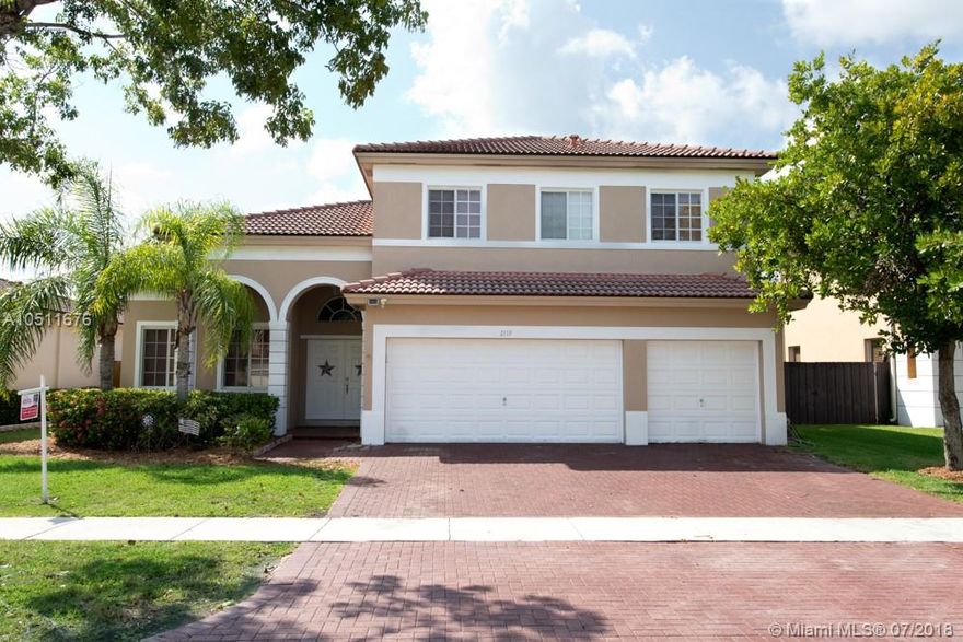 Make this amazing open floor plan, and lushly landscaped your new home today! Fall in love with it's large open rooms, living room w/ formal dining, family room & large eat in kitchen area which then flows into a HUGE kitchen.  Allow your inner gourmet cook to come out! Bedroom & bath 1st floor, 3 bedrooms & HUGE Master room upstairs w/ en suite bath featuring a Jacuzzi tub.  Walk outside to an oversize custom built patio surrounded by lush landscaping for privacy and those backyard parties. Community clubhouse features 3 pools and gym. Turnpike is just minutes away, as well as shopping and the Florida Keys. Be a part of this growing city with so much so close by. Call today this one won't last!