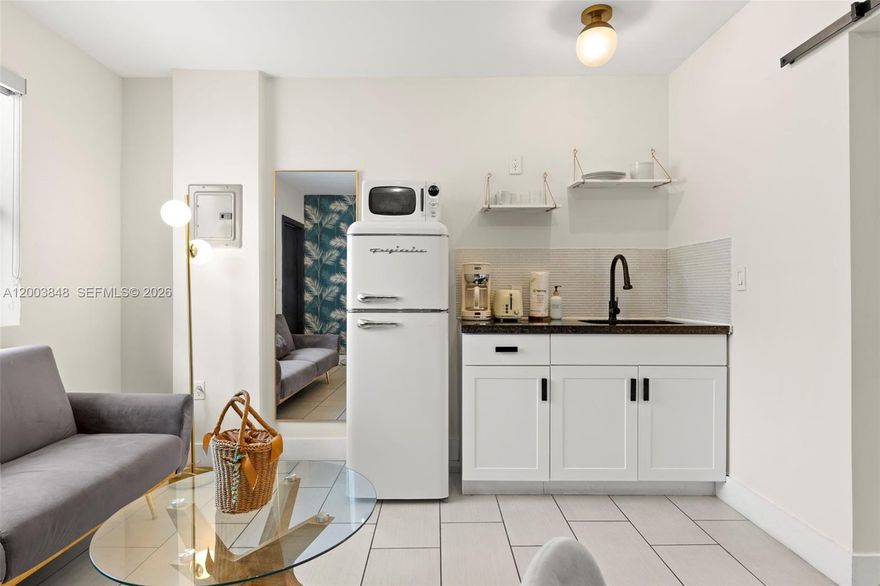 Byron Avenue Suites represents an exceptional opportunity.The property features 16 fully furnished apartments, including 2 two-bedroom units, 9 one-bedroom units, and 5 studios. Each unit is equipped with a kitchenette (sink, refrigerator, microwave), allowing flexibility for both short-term and extended stays. This diverse unit mix caters to a wide range of travelers, including vacationers, families, and longer-stay guests, supporting consistent occupancy year-round. A key competitive advantage is the property’s grandfathered hotel license. Due to strict zoning and regulatory constraints in Miami Beach, new licenses are extremely limited, creating a strong barrier to entry and protecting long-term asset value. Byron Avenue Suites also benefits from an outstanding guest reputation:The property ranks as the #1 top-reviewed hotel in Miami Beach out of approximately 1,270 hotels. This strong track record supports repeat business, premium pricing, and consistent performance.
There is clear upside potential through several strategic initiatives: implementing a direct booking platform to reduce platform fees and capture repeat guests. Additional enhancements, such as on-site laundry and outdoor amenities like a jacuzzi and lounge areas, offer opportunities to further increase revenue and guest satisfaction.