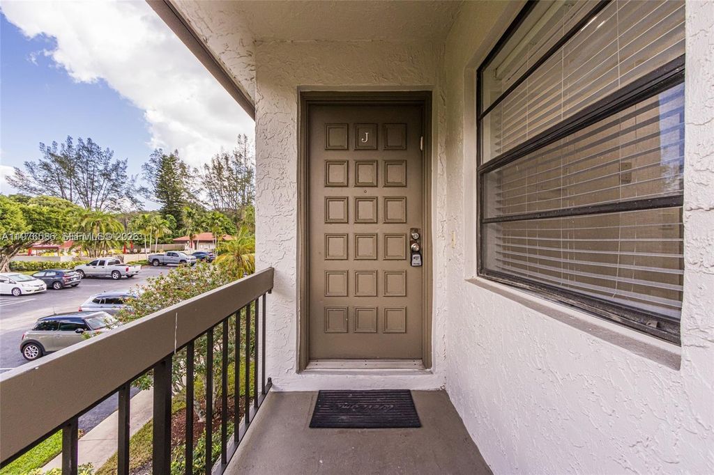 Photo of 21529 Cypress Hammock Dr #35J, Boca Raton, FL 33428 (MLS # A11976586)