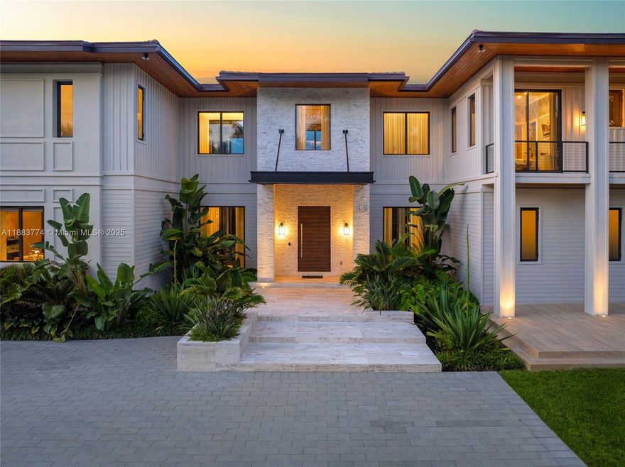 A timeless blend of elegance and comfort, this exceptional two-story residence offers 7 bedrooms, 7 full baths, and 1 half bath, thoughtfully curated for refined living. Soaring volume ceilings, impact glass, and bespoke built-ins elevate each space with understated sophistication. The gourmet kitchen showcases custom cabinetry, Wolf appliances, Sub-Zero refrigeration, and a Sub-Zero wine cooler, seamlessly flowing into the wet bar and living areas. A glass-enclosed porch with a summer kitchen featuring a pizza oven invites effortless indoor-outdoor entertaining. Additional highlights include a club room, media room, and the potential for a backyard pickleball court with available renderings.