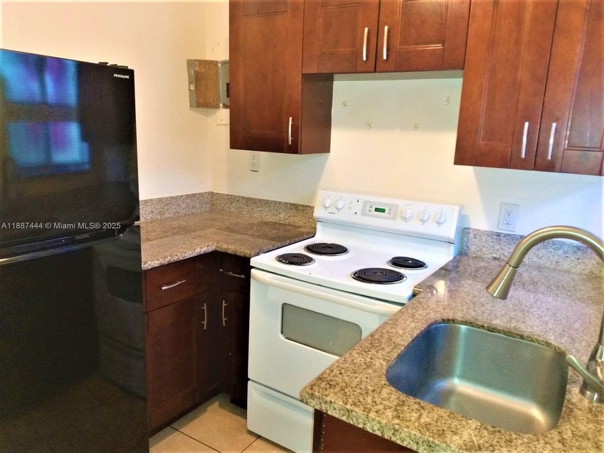 Welcome to this 2 bedroom, 1 bathroom unit East of I-95. This location is Conveniently located 10-11 minutes away from the public beach access, 7 minute drive to Outlet Shopping, 5-8 minutes commute to Downtown West Palm Beach where you may explore Bars, Restaurants and a progressive nightlife. Unit has impact windows throughout, tile flooring, granite counters in kitchen. Property has central air conditioning, and the property is completely fenced