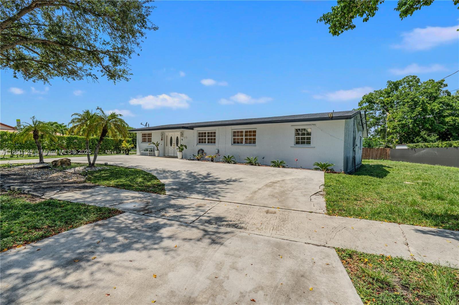 Amazing opportunity to Live or Rent out as investment. Located just minutes from Tropical Park, this neighborhood offers all the peace & tranquility one looks for in a family-oriented neighborhood. A corner lot home & situated between a dead-end street & canal (offering no rear neighbors) providing all the privacy one could wish for. A neighborhood w/ well-kept homes & larger lots. The home sits on over 13,100SF lot & over 2457SF of actual living space. Interior features include a large eat-in kitchen, oversized primary bdrm, well-appointed finishes, plenty of additional parking & space for a resort-style pool. Take advantage of this wonderful opportunity & live in comfort while enjoying all the benefits this location offers. Plus: New roof installation to be completed by soon.