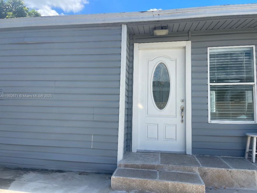 LARGEST MODEL 4 BEROOM 3 BATH MANUFACTURED HOME IN AMERICANA VILLAGE GATED COMMUNITY.THIS  UNIT HAS NEW LAMINATE THROUGHT ,FRESHLY PAINTED AND READY FOR NEW FAMILY. THIS UNIT IS CLOSE TO ENTRANCE OF COMMUNITY WITH NO NEIGHBORS IN BACK. LOW MAINTENANCE INCLUDES WATER ,SEWER AND GARBAGE PICK UP,LAND IS INCLUDED WITH SALE.
SELLER WILL CONTRIBUTE UPTO $10000.00 TOWARD BUYERS CLOSING COSTS.