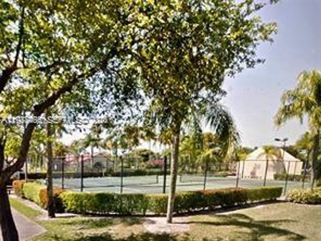 Photo of 901 Lyons Rd #1208, Coconut Creek, FL 33063 (MLS # A11988486)