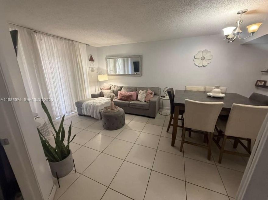 Beautiful and comfortable 2-bedroom, 1-bath apartment located  on the first floor in a quiet and well-established neighborhood in the heart of Kendall. This well-maintained home features a functional layout with remodeled bedrooms and an updated bathroom with modern finishes. Spacious closets include built-in drawer systems, offering excellent storage and organization. The bright living and dining areas create a welcoming atmosphere, complemented by a stylish kitchen with granite countertops, white cabinetry, and ample workspace. Enjoy the convenience of an in-unit washer and dryer. Additional highlights include tile flooring throughout, a private and cozy primary bedroom, and a versatile second bedroom perfect for family, guests, or a home office. The property includes 1 assigned parking space, along with plenty of additional guest parking available. Ideally located near major expressways, shopping centers, restaurants, schools, and everyday conveniences. sA great opportunity for comfortable living in a prime Kendall location.