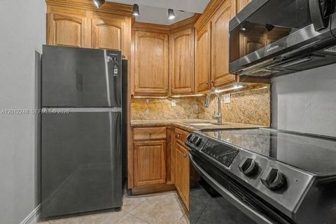 Photo of 8609 SW 68th Ct #22, Pinecrest, FL 33156 (MLS # A12012248)