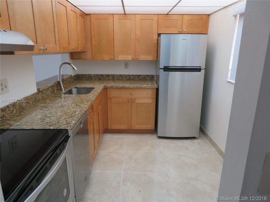 Better than the day it was built! Completely remodeled: both bathrooms, completely tiled, new wood cabinets with granite cabinet top, brand new SS appliances, new central air/heat system,  top floor corner unit, freshly painted, screened balcony overlooking tennis courts, vacant will be cleaned,   24 hour guard at gate, 3 pools, 4 tennis courts, gym under construction, roving guard in eve hours.