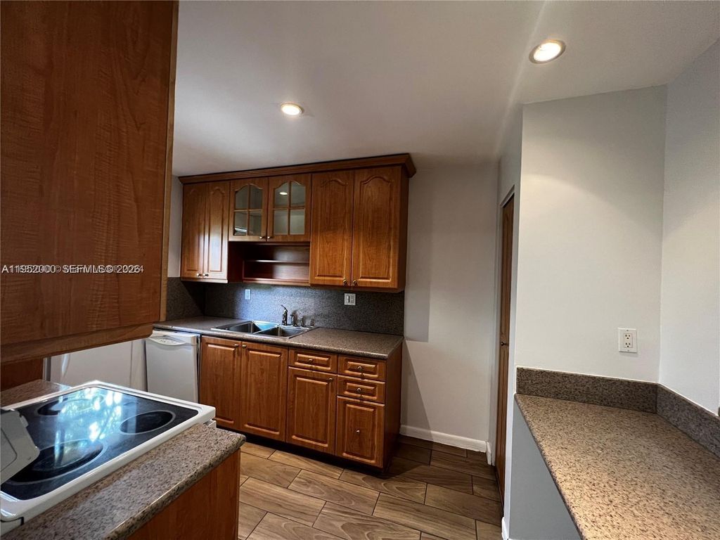 Photo of 4111 Stirling Rd #308, Dania Beach, FL 33314 (MLS # A11952000)