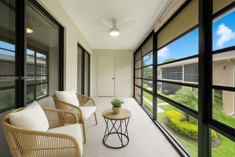 Photo of 7745 Ashmont Cir #207, Tamarac, FL 33321 (MLS # A11927895)