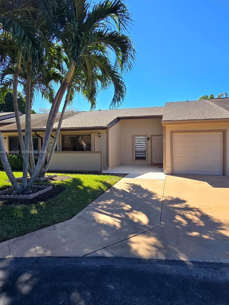Beautiful 2BR/2BA townhouse located in the desirable Boynton Lakes community in Boynton Beach | Move-in ready home featuring 1-car garage plus extended driveway for 2 additional vehicles | New roof (Nov 2025), AC (2023) & accordion hurricane shutters | Spacious open-concept layout connecting kitchen, dining, and living areas | Hard flooring throughout (NO carpet) | Generous closet space in both bedrooms | Primary suite with walk-in closet and private suite bathroom | YOU CAN’T BEAT THIS VIEW! Outdoor space perfect for a cozy terrace and relaxing afternoons with gorgeous, unobstructed views | Located in a quiet cul-de-sac offering added privacy and a safer setting | Peaceful, well-maintained community with resort-style amenities | Convenient location with easy access to I-95, shopping, dining, and schools | EASY TO SHOW