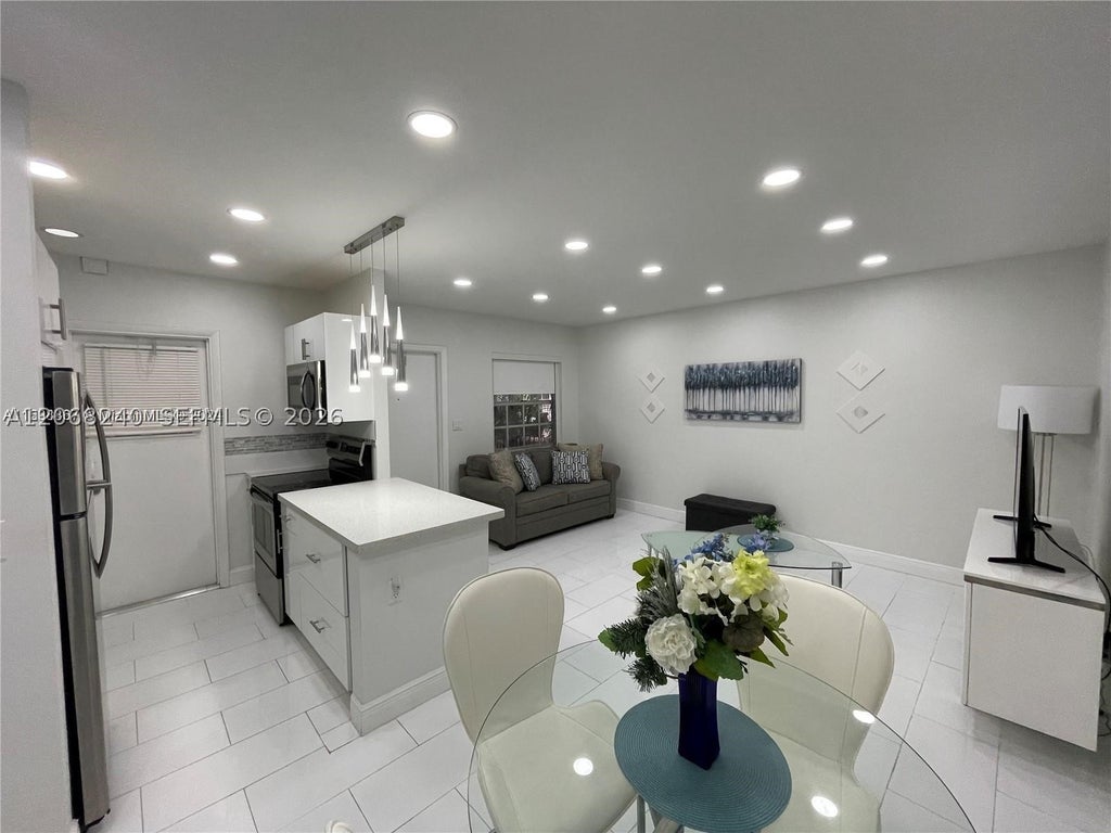 Photo of 1407 NE 56th St #103, Fort Lauderdale, FL 33334 (MLS # A12068240)