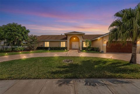 Photo of 450 NW 201st Ave, Pembroke Pines, FL 33029 (MLS # A11953582)