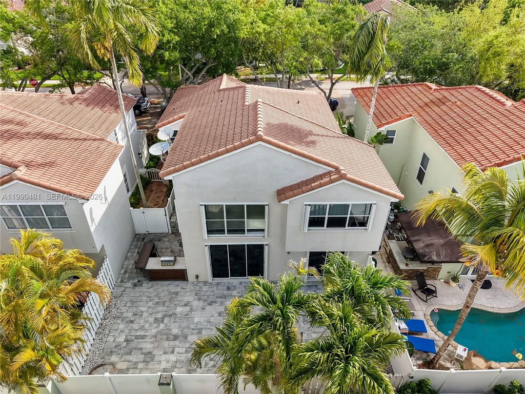 Photo of 876 Garnet Cir, Weston, FL 33326 (MLS # A11990481)