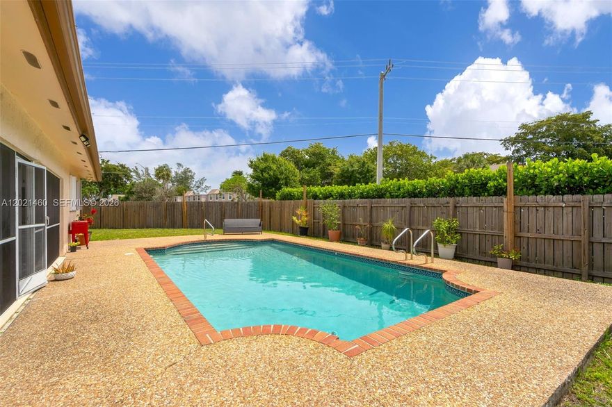 STUNNING CORNER LOT WITH A POOL! NO HOA & NO BACK NEIGHBORS! This beautifully remodeled 5 Bed/2BA pool home features brand new laminate flooring throughout, gorgeous white granite countertops, newer appliances, washer, dryer & water heater. Enjoy the screened patio overlooking your private below-ground pool, plus separate living & dining areas and a spacious walk-in closet. bring your offer today, this one won’t last!