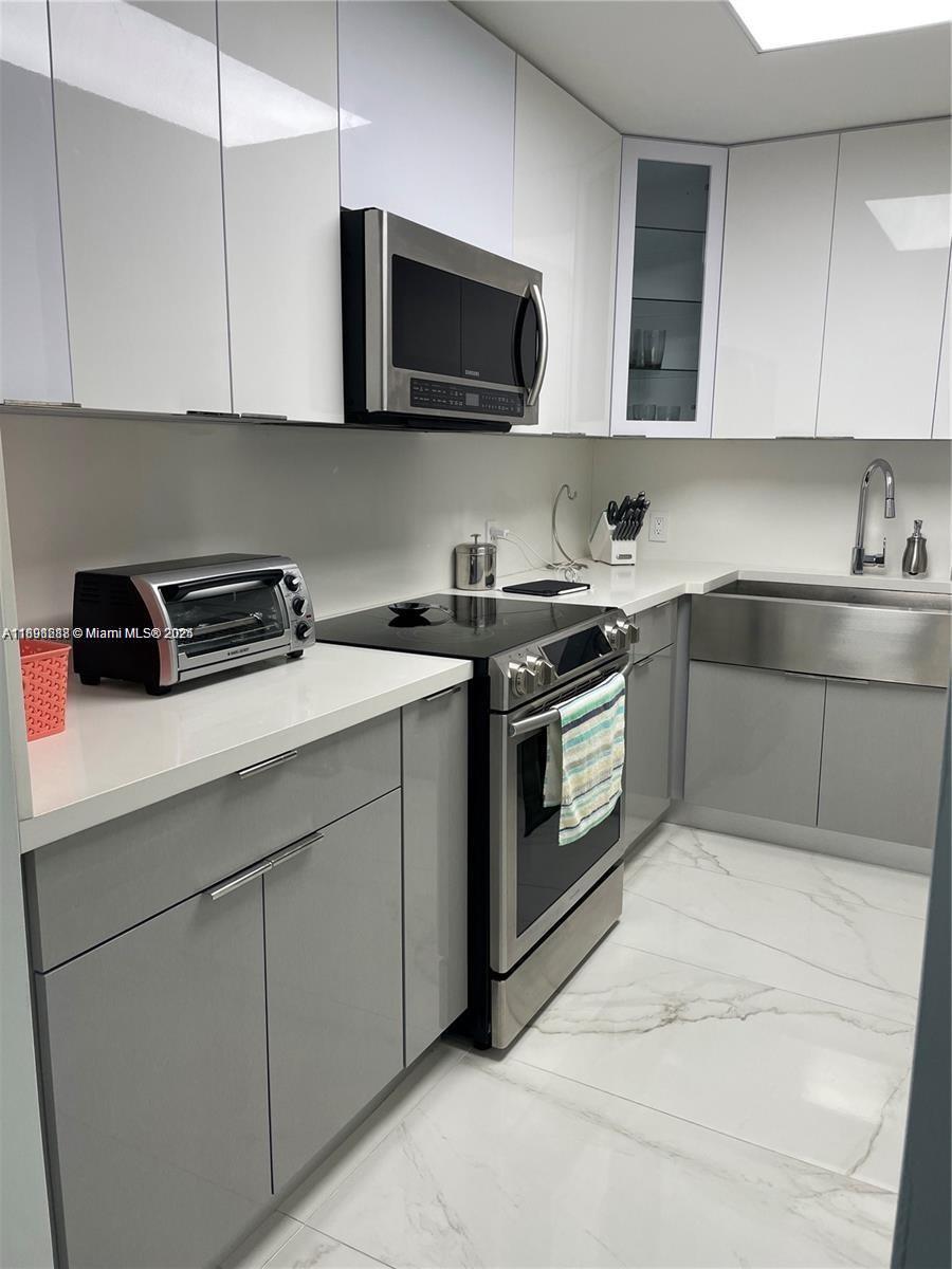 QUADOMAIN TOWER I AND IV - Residential Lease