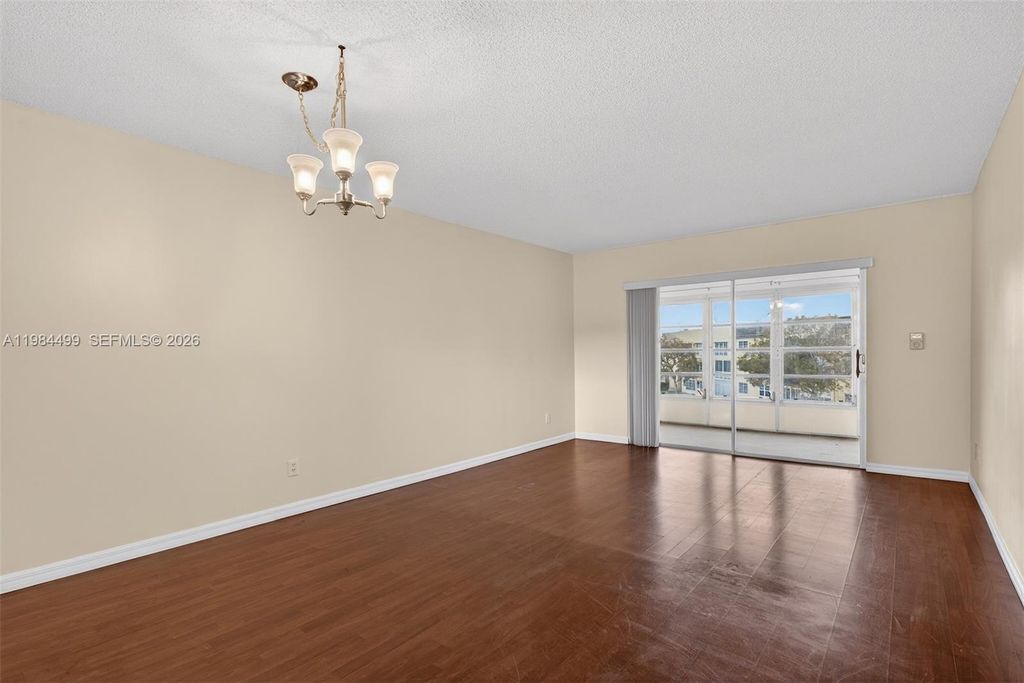 Photo of 6070 NW 64th Ave #308, Tamarac, FL 33319 (MLS # A11984499)